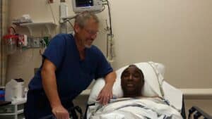 Dr. C. Kent Boese with patient Johnny Rodgers.